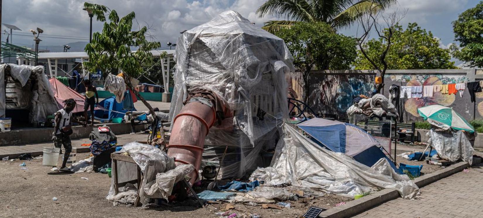  A children’s playground structure becomes a shelter for people in the Tabarre area of Port-au-Prince, Haiti.