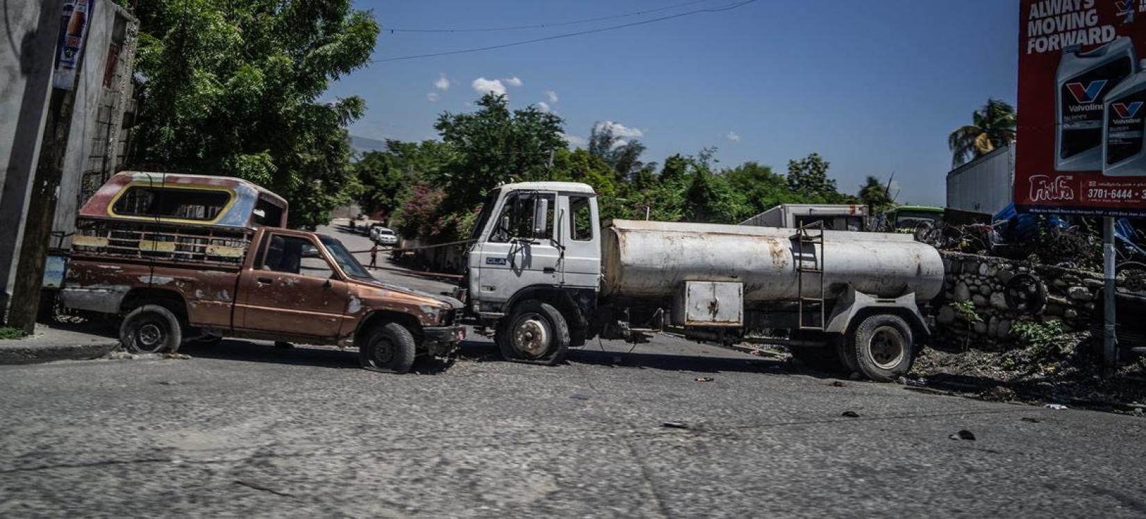 Communities in Port-au-Prince have erected barricades of abandoned vehicles to limit the risk of kidnappings and gang attacks.